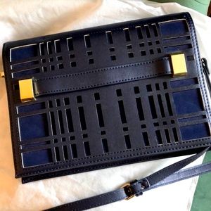 New navy clutch bag with strap